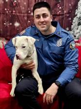 Robert Hahn with Reina, a nine-month-old deaf female pit bull-mix pup that he recently adopted from the West Milford Animal Shelter Society. (Photos provided)