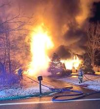 Fire severely damaged this single-family house at 1413 Macopin Road Tuesday evening, displacing three people. Photo provided by the West Milford Police.