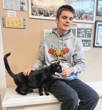 Ty Rockey, who is blind, began volunteering at the shelter last year.