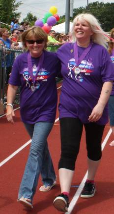 Relay for Life connects the community They walk - and smile. Photo by Ginny Raue