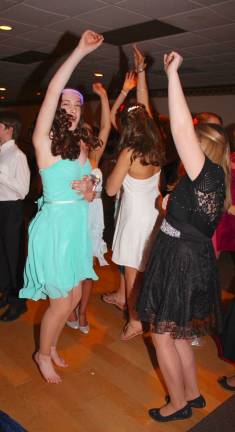 Great memories are made at the CASA semi-formal Arms up, jump off the floor, dance!