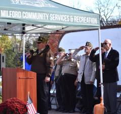 John Trojanowski, adjutant of Veterans of Foreign Wars Post 7198, sings the National Anthem at the Veterans Day ceremony. (Photos by Fred Ashplant)