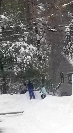 Once the winter storm had passed, these young people in West Milford found good packing snow for snowballs and snowmen.