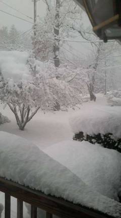 West Milford hit hard for second time in week, 21 inches of snow Photo submitted by Michele MonicaWest Milford resident shows what 18 inches of snow looked like in her back yard on Wednesday, March 7 during Winter Storm Quinn.