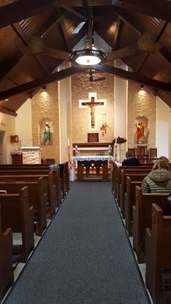 Bishop consecrates new altar at Our Lady Queen of Peace It took about six weeks to complete renovation work at Our Lady Queen of Peace Church.