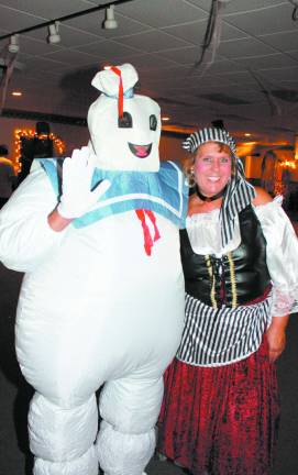 Elks Halloween dance is a real scream Mike Cappozzi as the Stay Puff and party coordinator Laura Paul as a wench made for a funny couple.