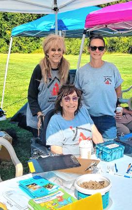 Dog Walk raises money for shelter West Milford Animal Shelter Society volunteers, from left, Flo Wilson, Janet Laycox and Andrea DeSalvia.