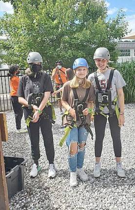 One of activities Senior and Ambassador Girl Scouts of West Milford Troop 94899 completed was the high ropes course and zip lining at the Treetop Adventure Course in West Orange. Photos provided by Christina Rodek.