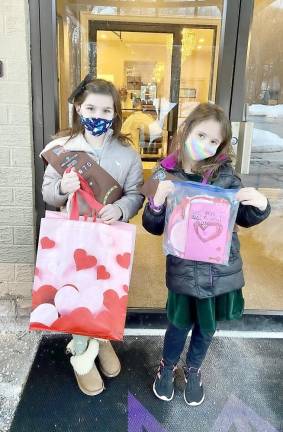 On Friday, Feb. 12, Troop 97670 Brownies Calla and Julie put on their sweetest “Brownie Smiles’’ under their face masks and represented their troop to deliver the sweet Valentines and treats to the Milford Manor Rehabilitation and Nursing Center in West Milford for the residents to enjoy.