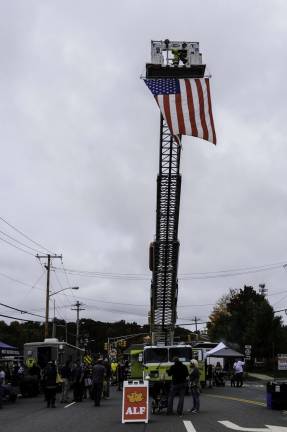 Sweet ALF Old Glory flying high in the leaden skies that never shed any precipitation during the entire festival.