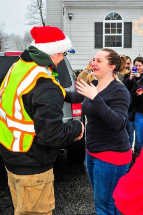Jillian Albrecht was stunned by Mike Miller's proposal. He truly surprised her last Sunday as she and her family awaited Santa's arrival on Orleans Lane.