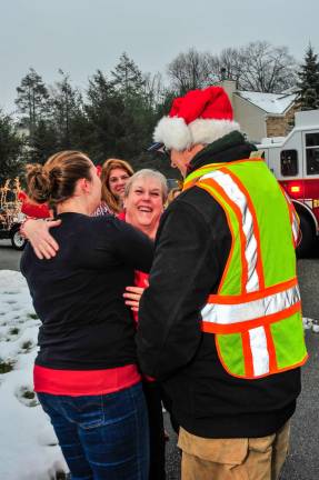 Photos by Mark Cranston Jillian Albrecht gives her mom a hug after her boyfriend Mike Miller proposed.