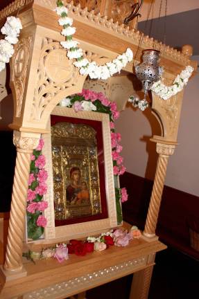 A celebration of Mary This exceptional icon is carried, within its ornate housing, in a procession honoring Santa Maria.