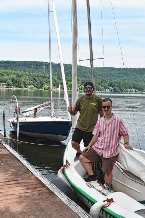Regatta features strong competition Brad Nickels, left, with Asa Green of the Lake Fenton Sailing Club in Fenton, Mich.