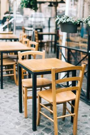 New Jersey will lift all COVID-19 outdoor gathering limits and remove a 50 percent capacity limit on indoor restaurants and bars beginning on Wednesday, May 19, as long as social distancing can be maintained. Photo illustration by Gabriella Clare Marino on Unsplash.