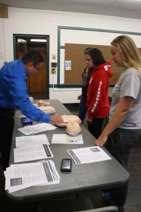 Victor Ferrer explains what to do before administering Narcan to someone suffering an overdose.