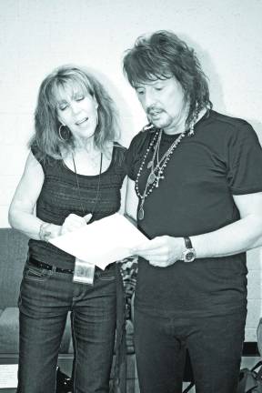 The Journey continues Richie Sambora sings part of his new song, "Lighthouse," to West Milford's Maureen Morella at an anti-drug forum in Toms River in May. Sambora wrote the song to encourage those struggling with substance abuse.