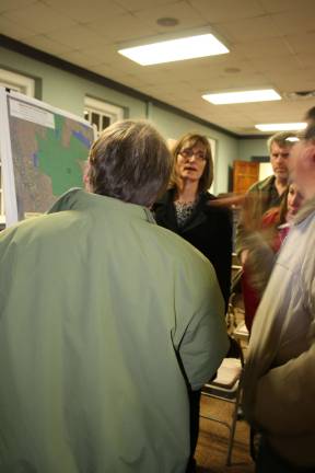 Photo by Linda Smith Hancharick Linda Gloshinski of the Land Conservancy of New Jersey discusses the map depicting the 100 acre property the township is looking to buy.