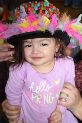 Mila Chesk, 2, had the hat of the day! Mila won the bonnet contest but it took some support to keep it on her head. It was decorated with pounds of jelly beans.