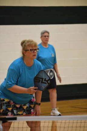 Lucy Merklee, left, and Sandra Ferrarella in action during the pickleball tournament. They won the Beginner Division.