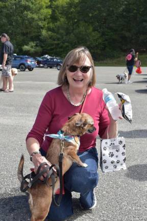 People, dogs dress up for occasion