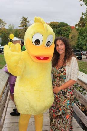 It was smooth sailing for the ducks Duck, Mayor. Well, that doesn't sound right. Duck and Mayor. Elks Club Duck Race, Saturday, 10/6/12. Mayor Bettina Bieri and duck mascot. Photo by Ginny Raue.