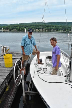 Regatta features strong competition Awosting Yacht Squadron fleet captain Jack Roe with his grandson and crew member, John Ellis, 12.