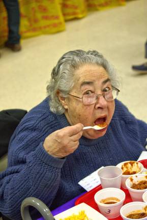 The very best chili around Doris Aaronson enjoys her chil, which was served with homemade cornbread.