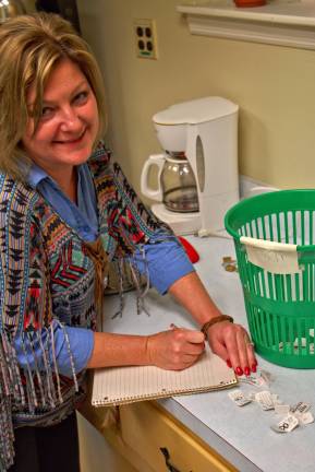 The very best chili around Dawn Syvertsen tallies the votes at the Presbyterian chuch's chili cook off.