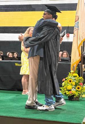 Photos: West Milford High School graduation A graduate gets a hug.