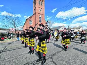 The Pipes &amp; Drums of the West Milford High School Highlander Band performs in the St. Patrick’s Day Parade on Sunday, May 17 in Warwick, N.Y. (Photo by Lisa Reider)
