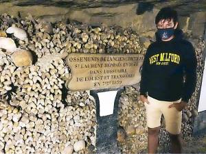 Ruben Koenig sports his much-loved West Milford sweatshirt at the catacombs in Rome, Italy, after spending four months there with his girlfriend, Alessandra Marra (West Milford native). He and Alessandra are now in Holland. Ruben runs a non-profit in Kenya, Africa (Strichting Kisiwa), which funds education and food for children in need. Provided photo.