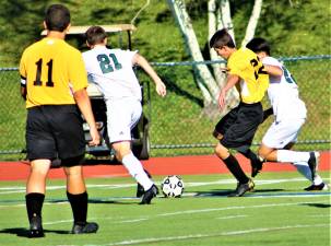 The Highlanders battle during Tuesday's 3-1 loss to Passaic Valley.