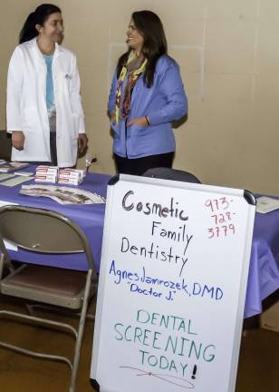 Staying healthy Agnes Jamrozek, DMD, also known as "Dr. J" to her patients at Cosmetic Family Dentistry, gave free dental screenings to fair goers.