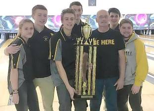 West Milford High School bowling coach John M. Caillie Sr. is pictured with members of the “New Year’s Team Championship” in 2018. The coach died last month. His family is hosting a celebration of his life on Sunday, Aug. 29, at Boonton Lanes. And you are invited. Photo provided by the Caillie family.