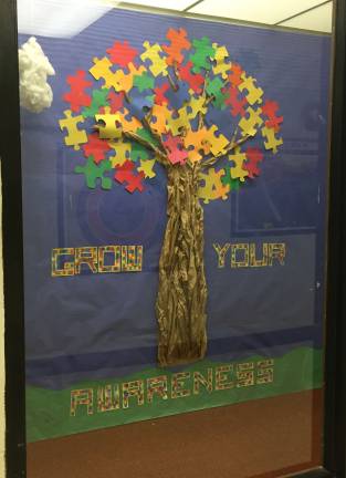 District 'lights it up blue' for autism awareness The high school had its own display to support autism awareness.