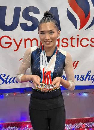 Park wins state championship MP1 West Milford High School sophomore Madeline Park holds medals she won at the USA Gymnastics New Jersey State Championships on Friday, May 2. (Photo provided)