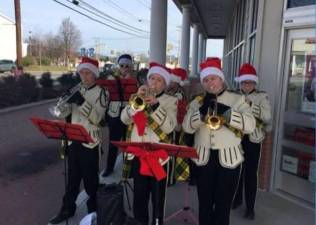West Milford High School Band Students will be providing seasonal entertainment and spreading joy and cheer instead of giving tags for donations at their annual “Tag Day” fund-raising event this Saturday, Dec. 4.