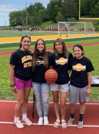 Left to right, the WM basketbal team captains: Sam Araujo, Rebecca DeTuro, Olivia Arciniega, Rachel Chandler