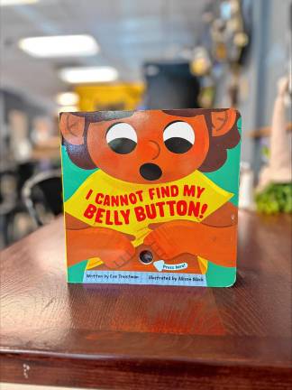 From pandemic project to publication The book’s cover has a button that children can press for sensory stimulation.