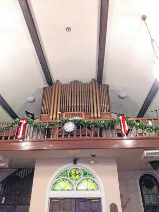 One Christmas tradition continues The old pipe organ at St. Joseph’s Church remains and can be played. (Photo by Bill Marra)