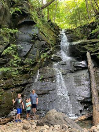 Local family visits more than 80 waterfalls since March Sam, Maximilian, and Nico at Slateford Creek Waterfalls.