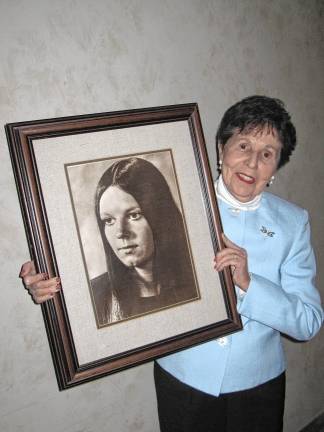 ‘Most public case since the Lindbergh kidnapping’ Julia Quinlan holds a photo of her daughter Karen Ann, who died in 1985. (Photo provided)