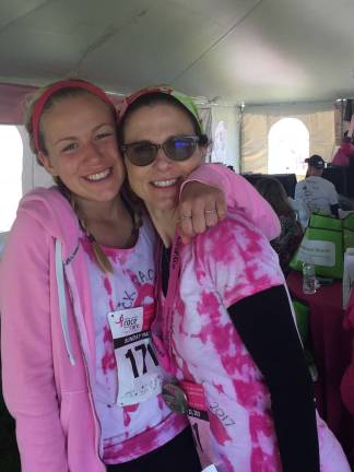 Susan G. Komen North Jersey honors local volunteer Photo provided West Milford's Judy Swajger, right, and daughter Kate take a breather after participating in the Race for the Cure in May.