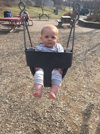 Oh Baby it's Spring! Baby Photo Contest Photo, Trish Gondelman of Sparta Lucas is swinging and enjoying a spring day at the park.