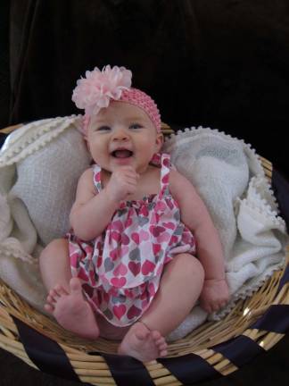 Oh Baby it's Spring! Baby Photo Contest Photo, Julie Gustafson of West Milford Ava Jeanne. "The Easter Bunny left an early package in our basket."