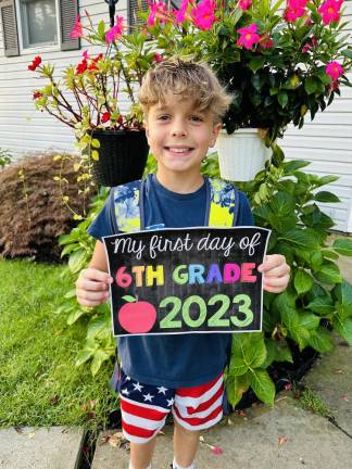 First day of school in West Milford Jake smiles into sixth grade.