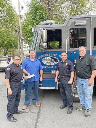 West Milford. Fund raiser for a fallen brother The Upper Greenwood Lake. Volunteer Fire Company held a fund raiser for firefighter Jared Lloyd of the Spring Valley Columbian Engine Company who lost his life helping to evacuate residents at a massive fire at the Evergreen Court Home for Adults. Pictured from left to right are: U.G.L. President Bob Bartilucci, Columbian Chief Ken Conjura, U.G.L. Chief Kevin Kiel and Columbian President Robert Johnson. Photo provided by Bob Bartilucci.