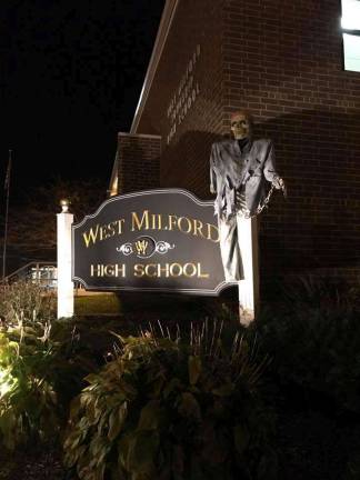 'Spooktacular' fundraiser a gargantuan success A spooky skeleton guards the sign at the high school. photo provided