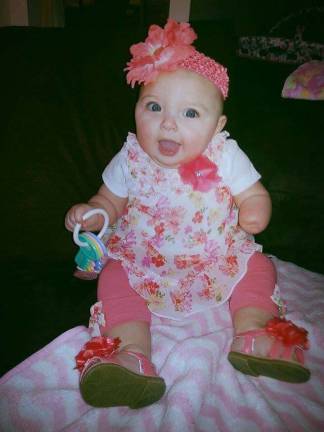 Oh Baby it's Spring! Baby Photo Contest Photo, Jessica Coursen of Sussex Gianna Russell, 8 months old. "Spring is here and I have the keys to happiness and sunshine!"